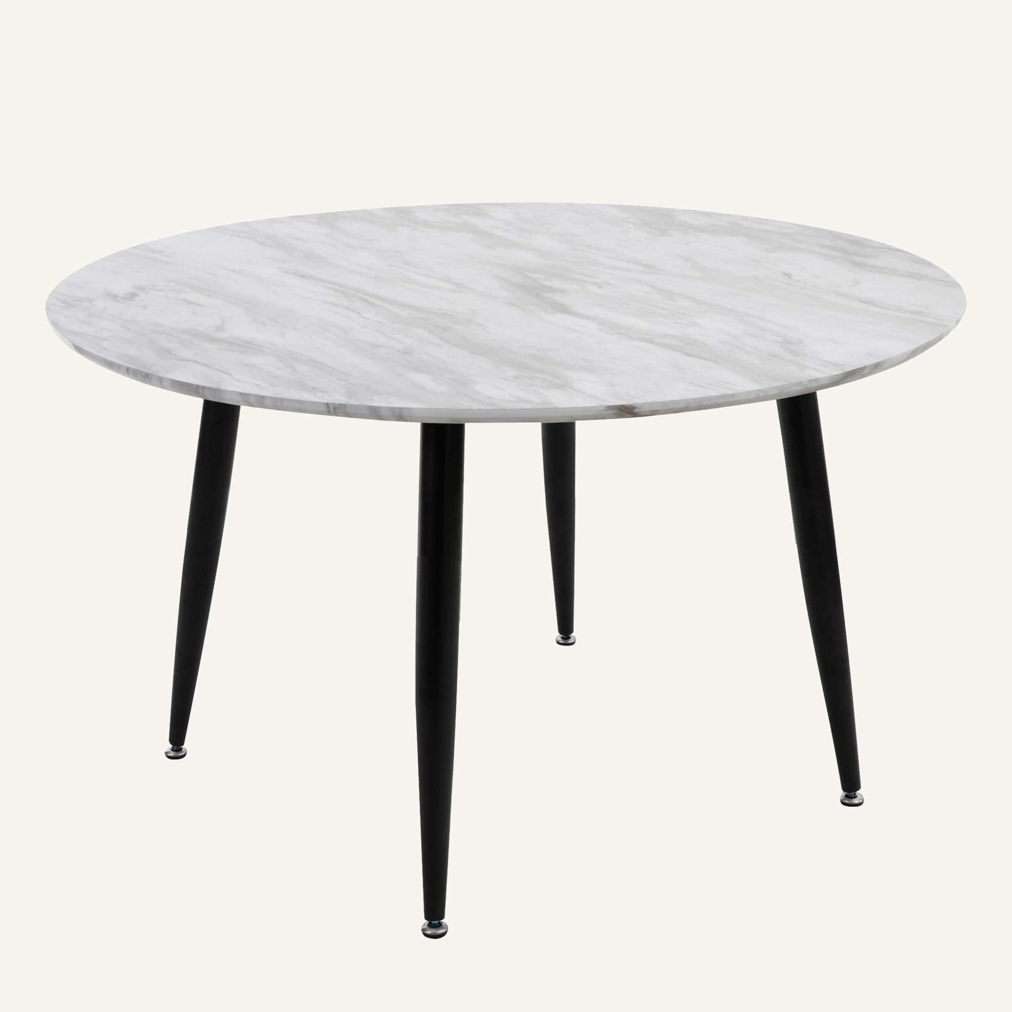 Minimalist round coffee table with marble effect top and black tapered legs.