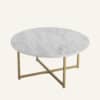 White marble effect round coffee table with gold metal legs.