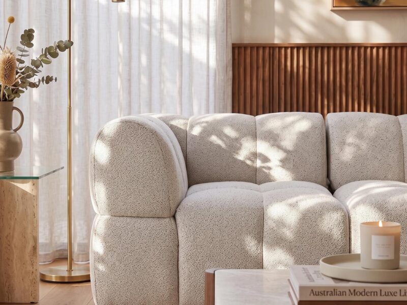 Modern lounge sofa with textured fabric in a stylish living room setting.